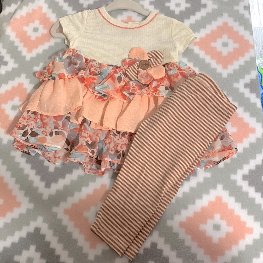 Baby flare top and strip leggings out.
